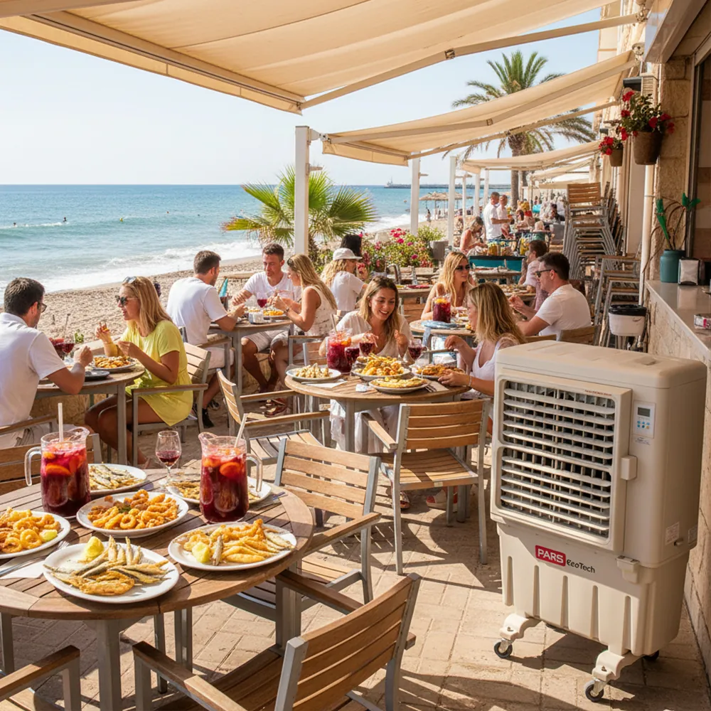 Climatizador evaporativo ECO-9000 en una terraza con toldo junto al mar con clientes comiendo en las mesas